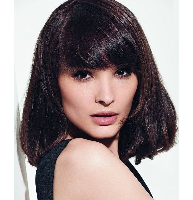 medium length hairstyle with side blunt bangs