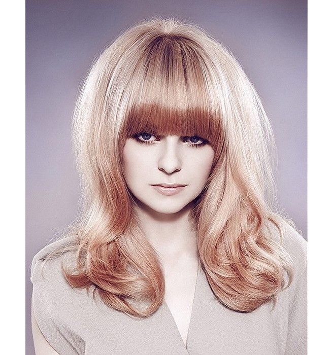 long blonde hairstyle with blunt bangs, sixties style